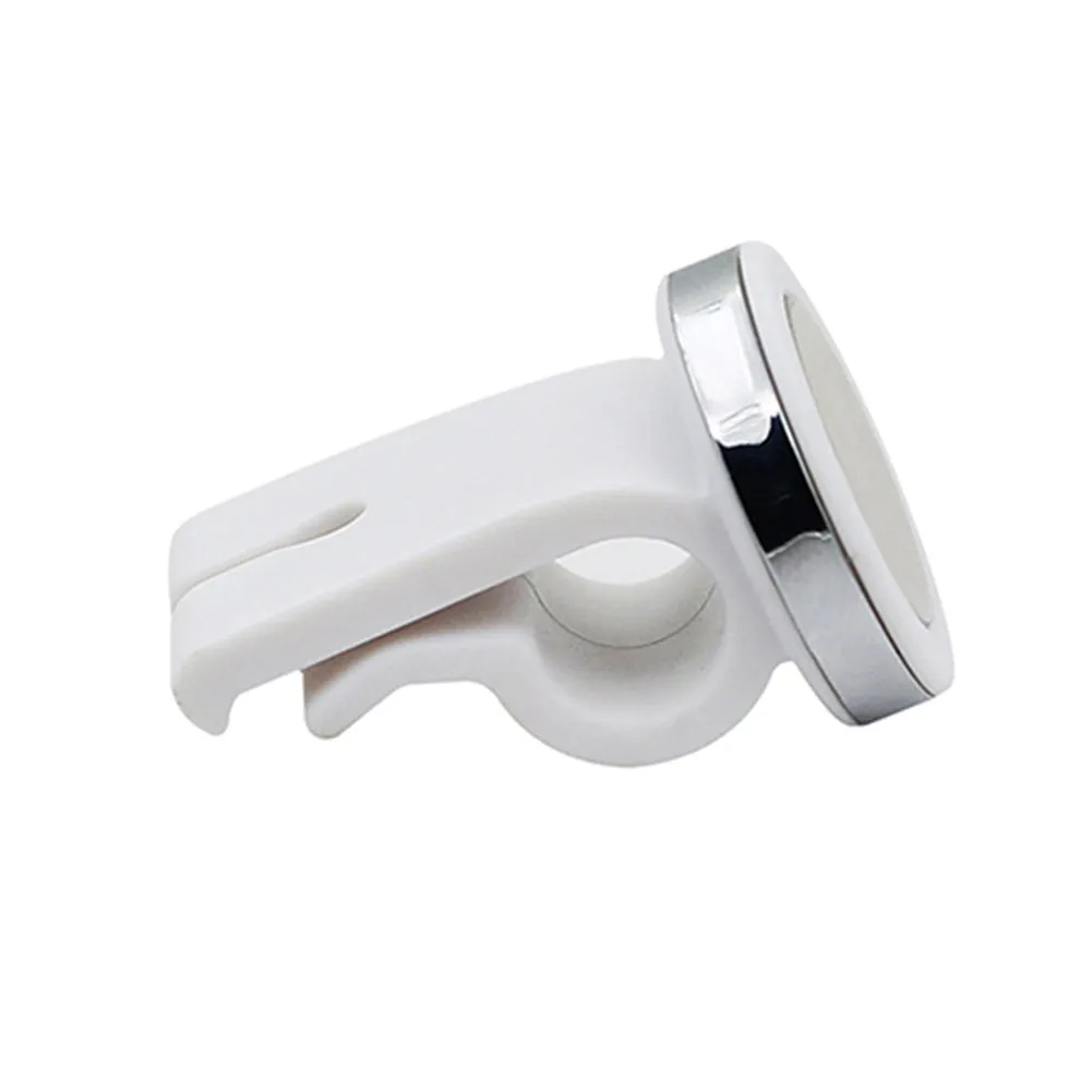 Mini white magnetic car phone holder clipped on car air vent showing compact 3cm size