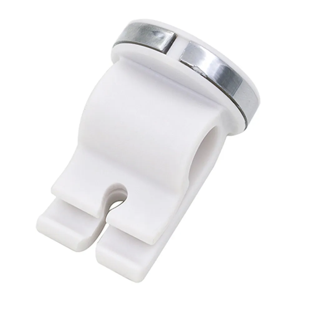 Mini white magnetic car phone holder clipped on car air vent showing compact 3cm size
