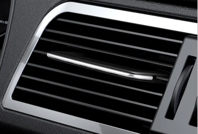 Car air-conditioning vent aromatherapy perfume clip in black with invisible paddle design
