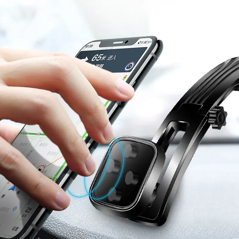 Black car centre console magnetic suction cup phone holder with slide rail and automatic lock mounted on dashboard