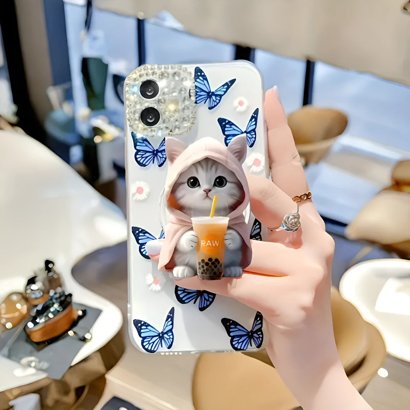Creative cartoon acrylic flat phone holder with transparent support in milk tea cat design on a desk