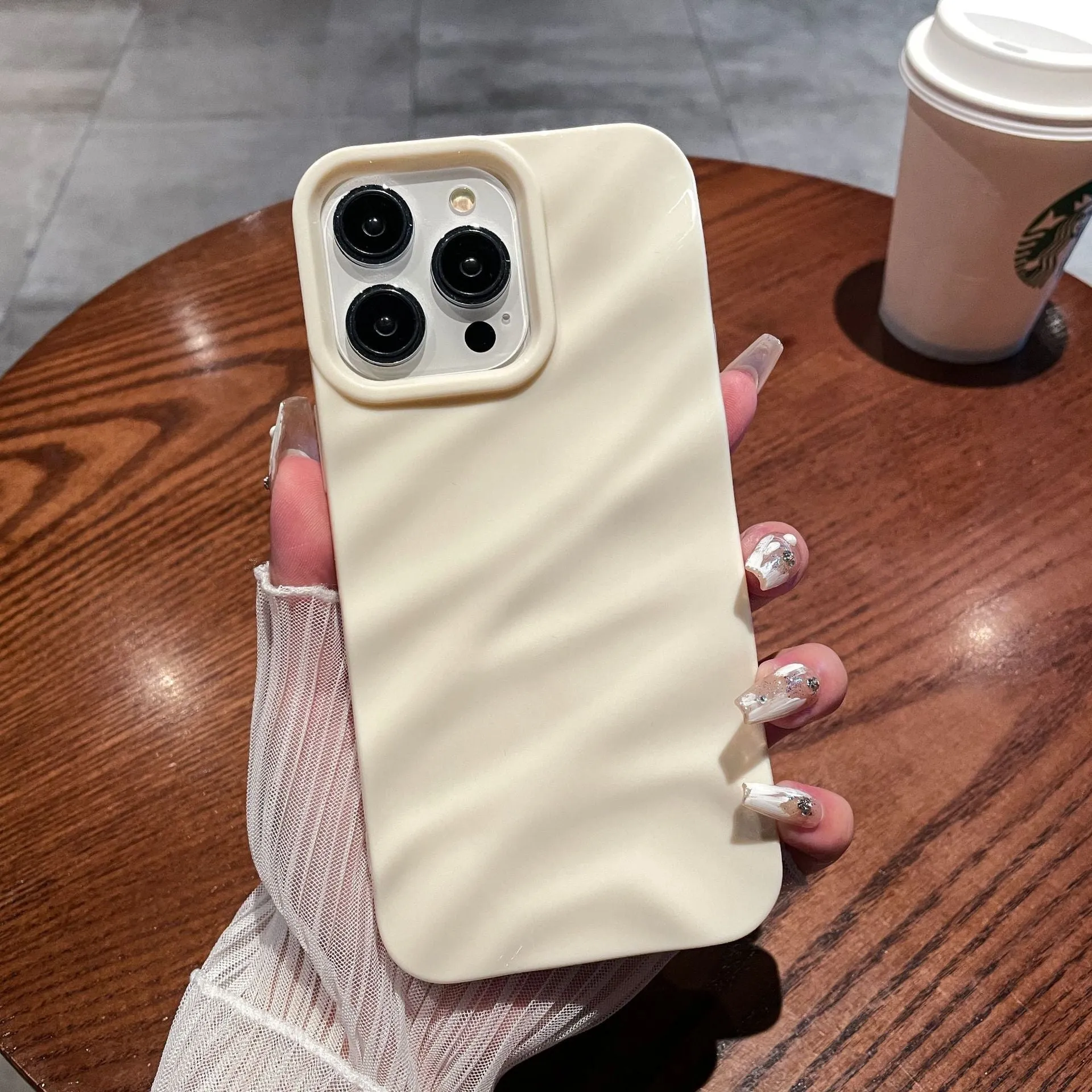 TPU soft shell phone case with three-dimensional pleated pattern in black for iPhone