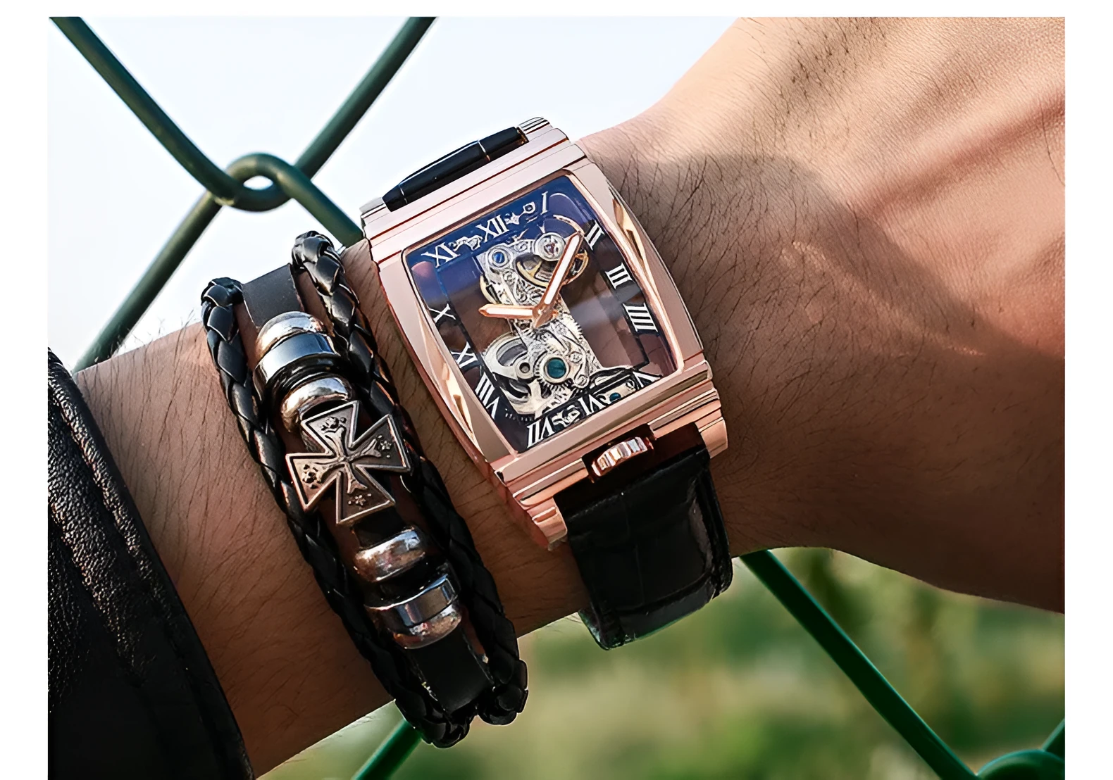 Daystar square stainless steel mechanical watch with leather strap on wrist, showing white dial