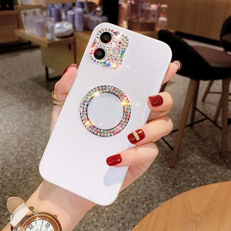 Luxury rhinestone TPU back cover phone case in purple, pink, and white for iPhone