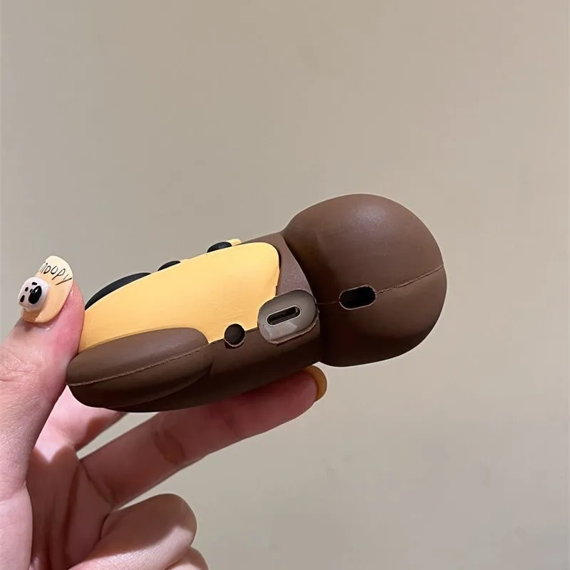 Brown puppy silicone earphone case on AirPods charging case with embossed cartoon design