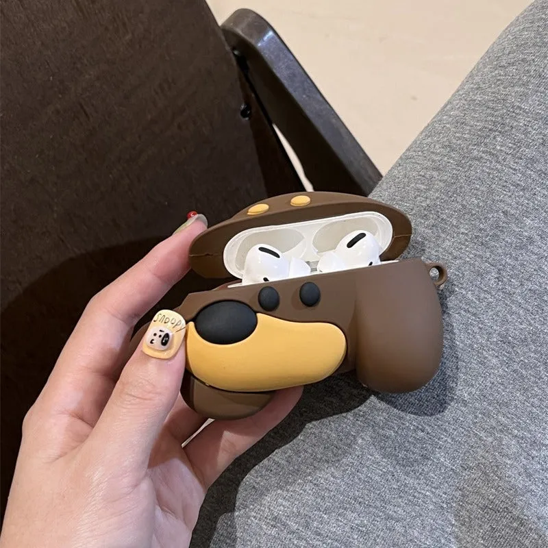 Brown puppy silicone earphone case on AirPods charging case with embossed cartoon design