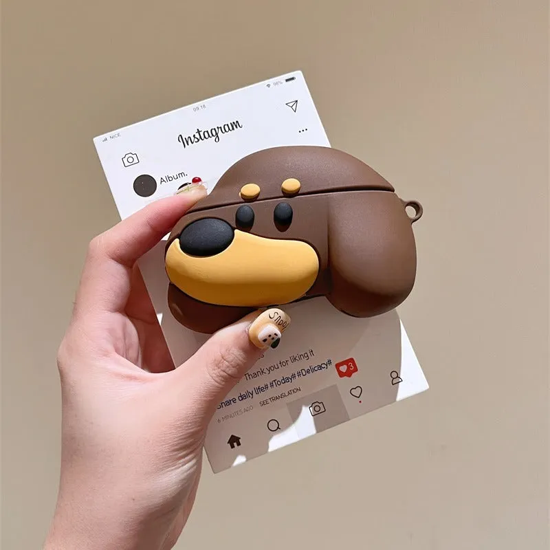 Brown puppy silicone earphone case on AirPods charging case with embossed cartoon design