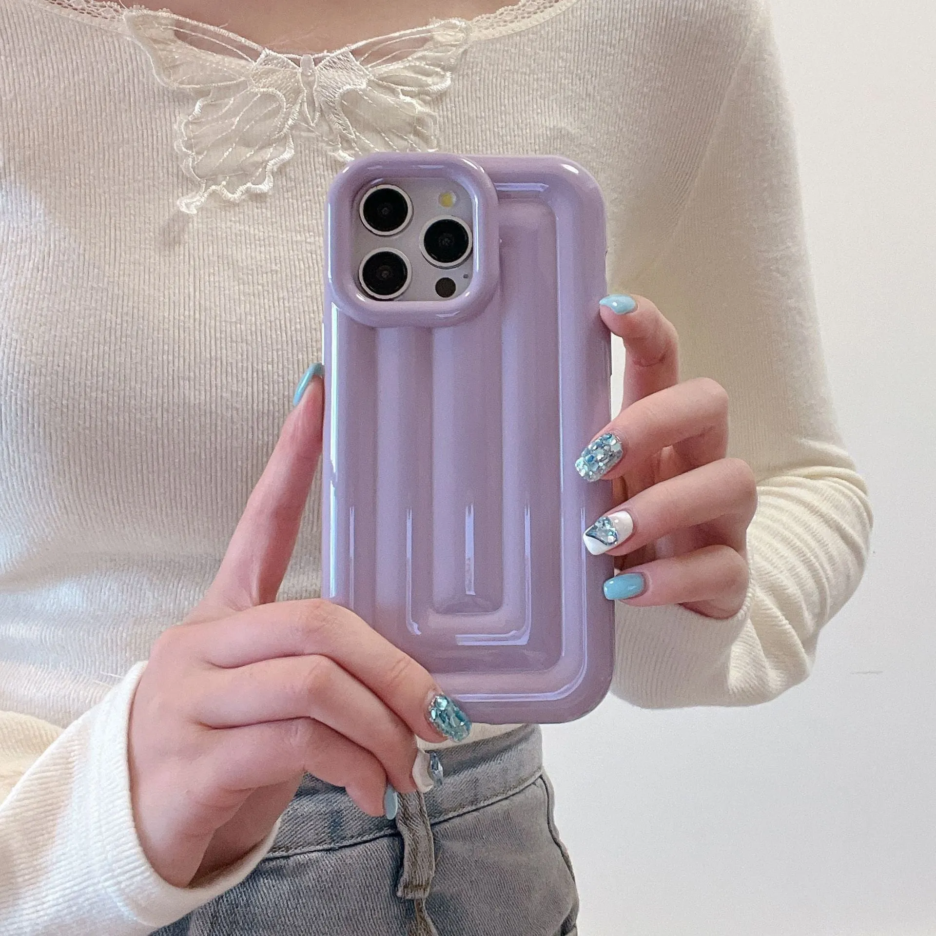 TPU electroplated three-dimensional striped phone case for iPhone 11–14 series in cream white colour