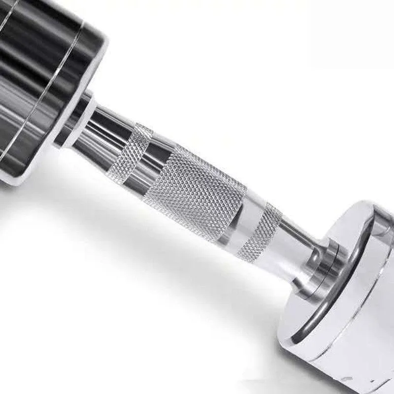 Silver pure steel dumbbell with textured ergonomic handle on a grey background.