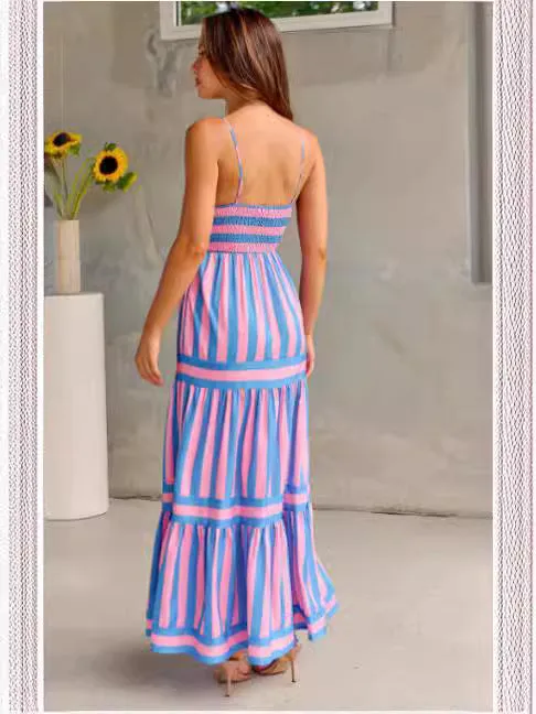 Long striped backless summer dress with square neckline and side pockets on a mannequin