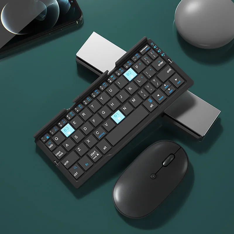 Silver white folding Bluetooth keyboard shown open with stand supporting a smartphone