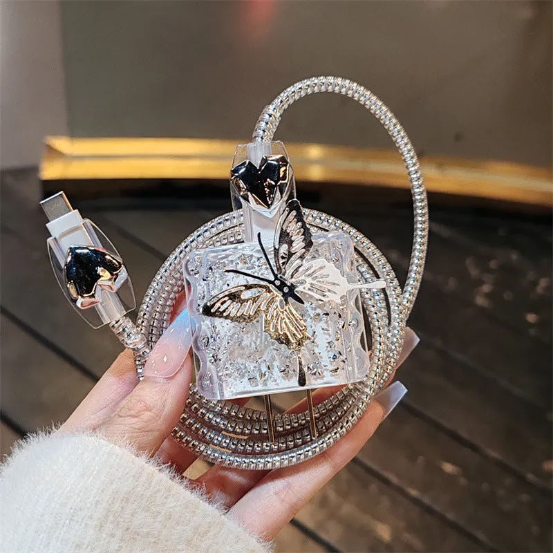 Three-dimensional butterfly USB cable protection sleeve in silver foil for data cable organisation