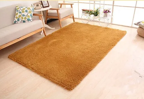 Solid colour plush rectangle carpet with soft velvet pile and non-slip dotted backing.