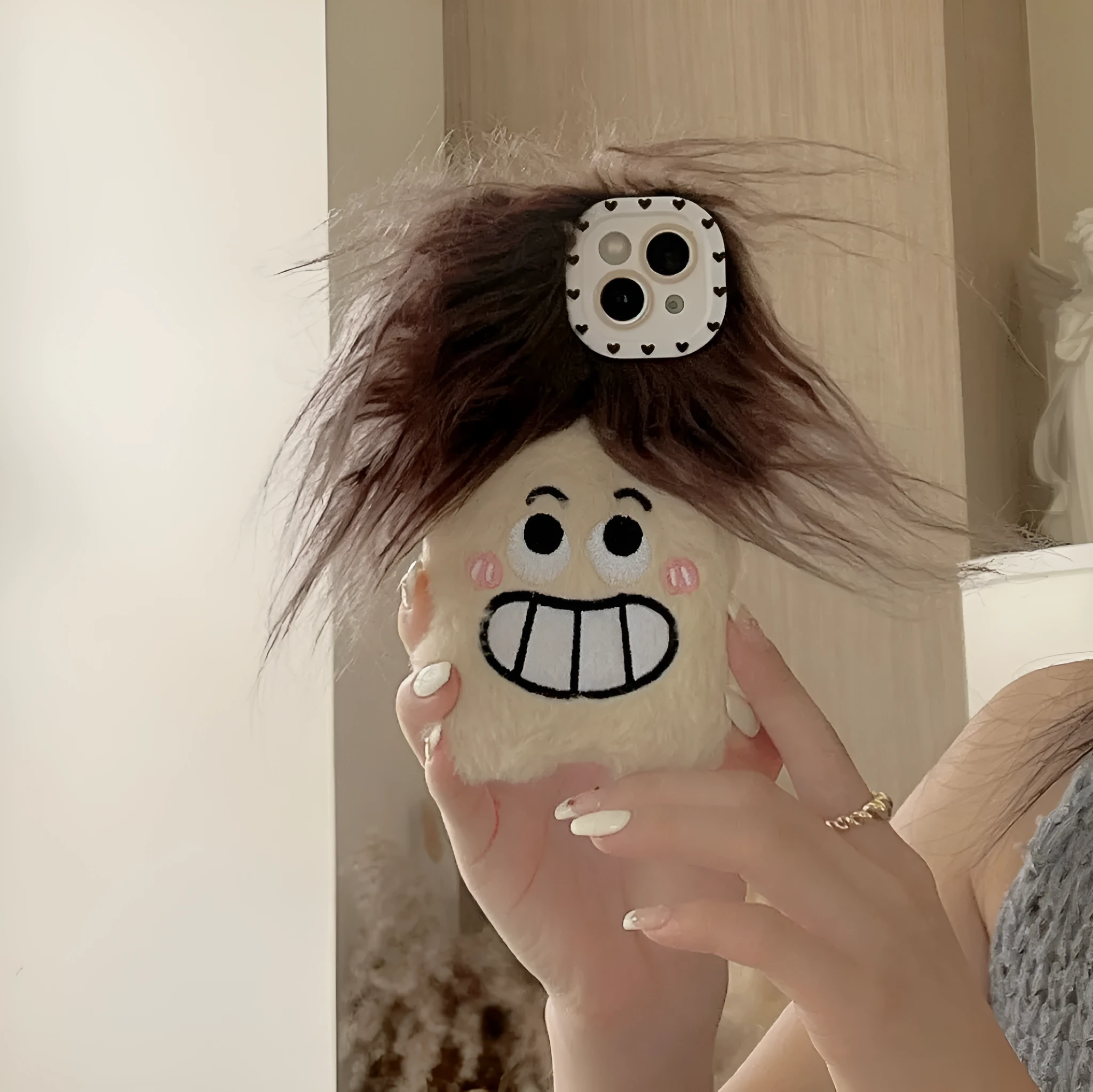 Plush long hair giggle boy smirk phone case for iPhone, cartoon furry fall protection cover, colour matching
