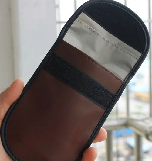 Black microfiber faraday bag for blocking car key fob and RFID card signals.