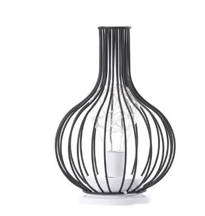Minimalist hollow wrought iron table lamp with warm white LED light in decorative bottle style