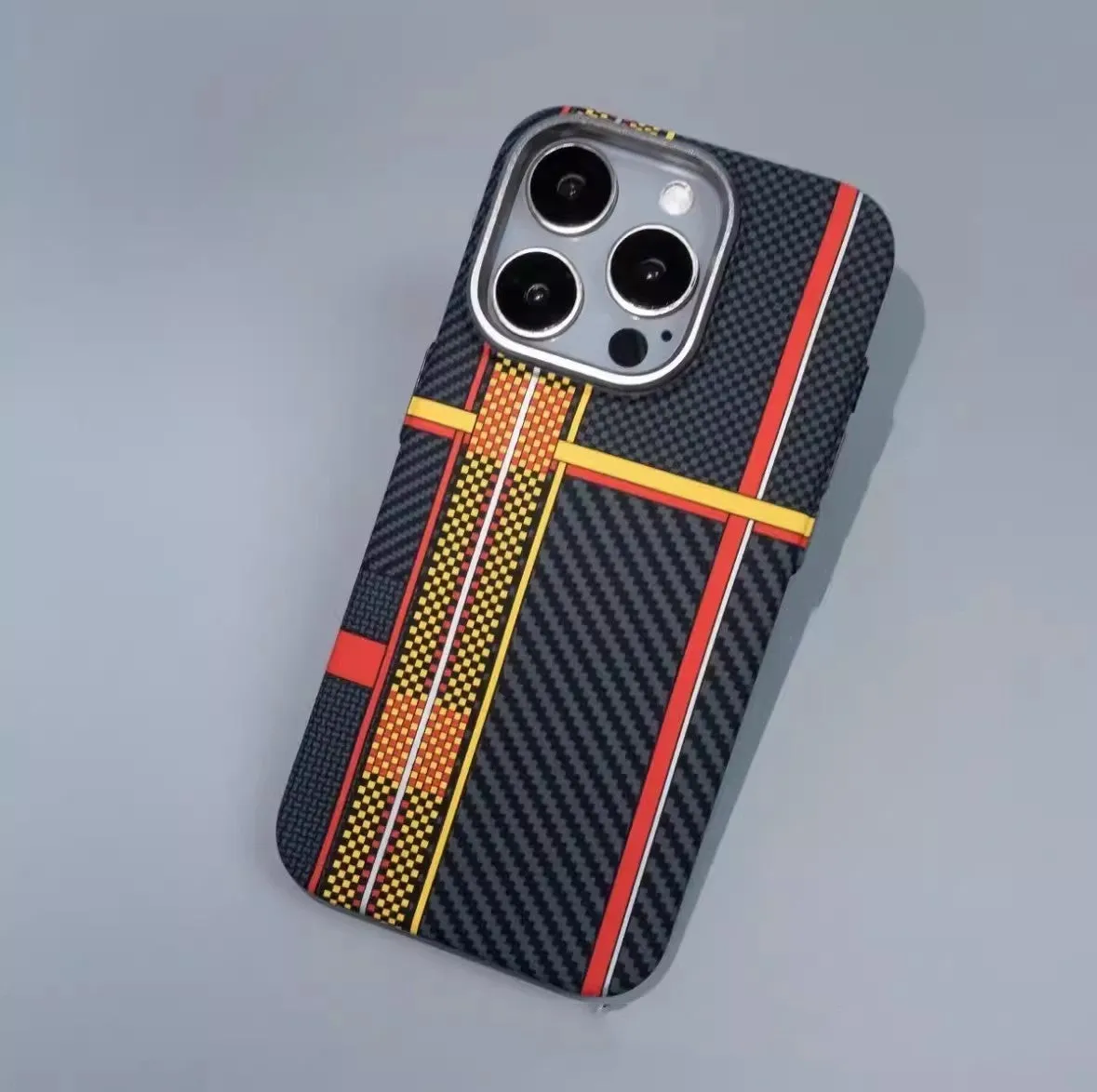 Carbon fiber grain magnetic phone case for iPhone 15 in grey finish with textured surface and camera cutout