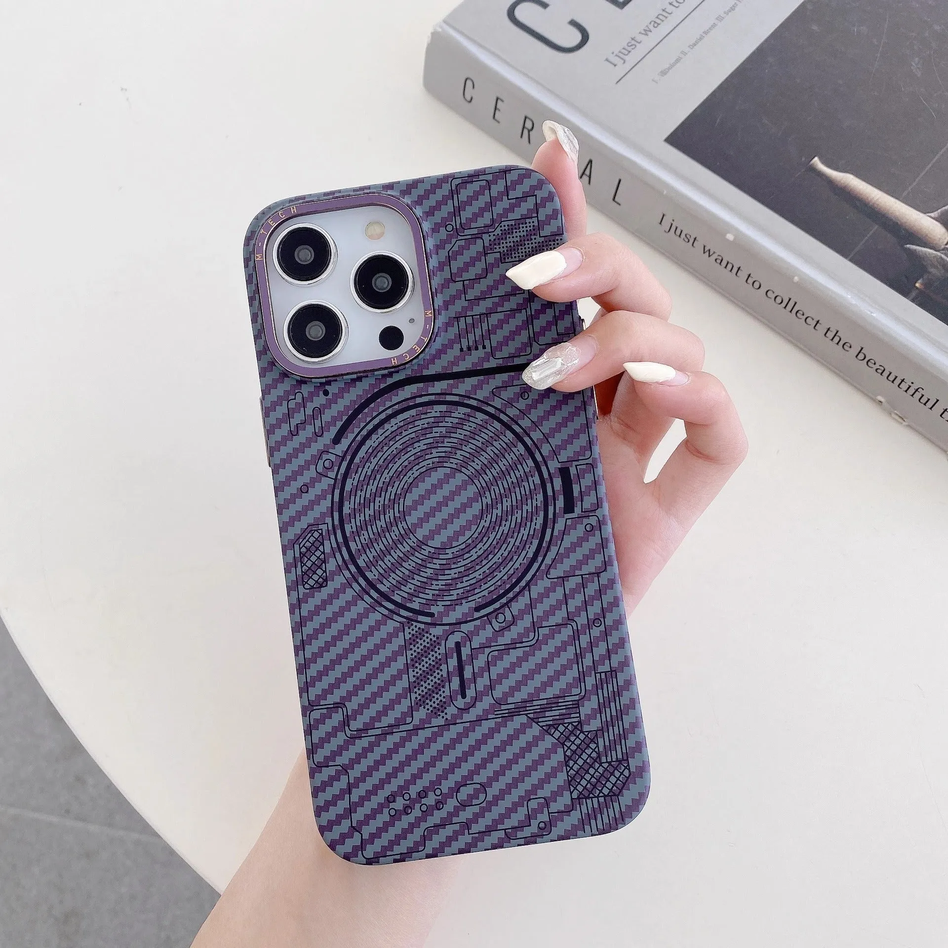 PC phone case with carbon fiber grain texture, Graphite Black colour, magnetic ring visible, for iPhone series.