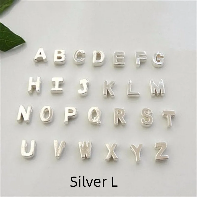 Peach heart shaped letter necklace pendant in gold or silver alloy, weighing 5.5g.