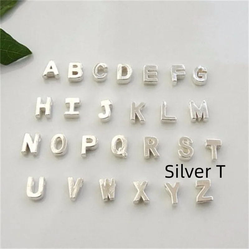 Peach heart shaped letter necklace pendant in gold or silver alloy, weighing 5.5g.