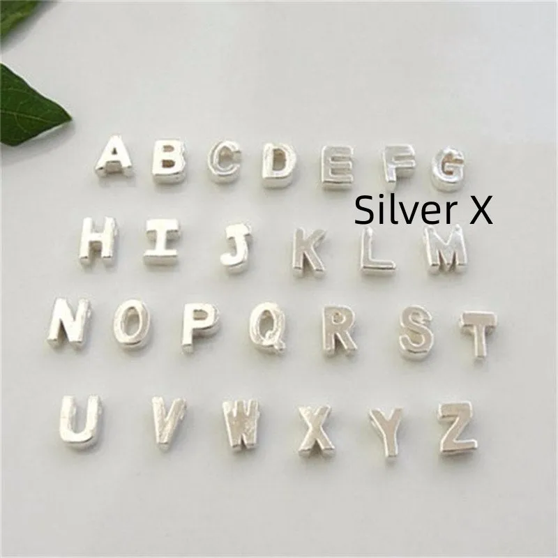 Peach heart shaped letter necklace pendant in gold or silver alloy, weighing 5.5g.