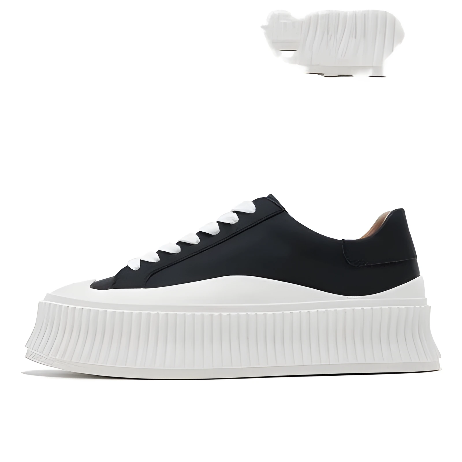 Women's white suede mid-top trainers with thick sole, back lacing, and cross binding detail on the heel.
