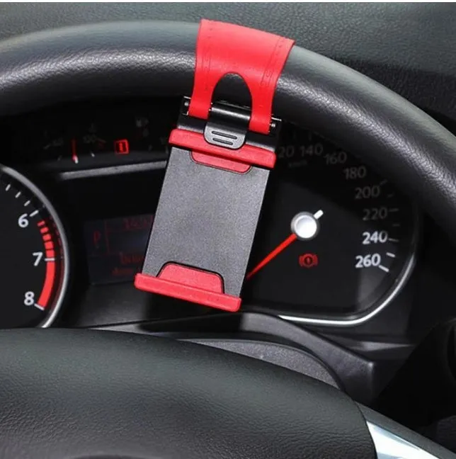 Universal black steering wheel phone holder mount clipped onto a car steering wheel.