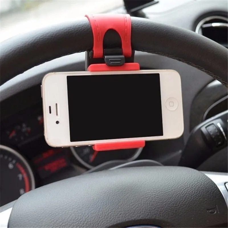 Universal black steering wheel phone holder mount clipped onto a car steering wheel.