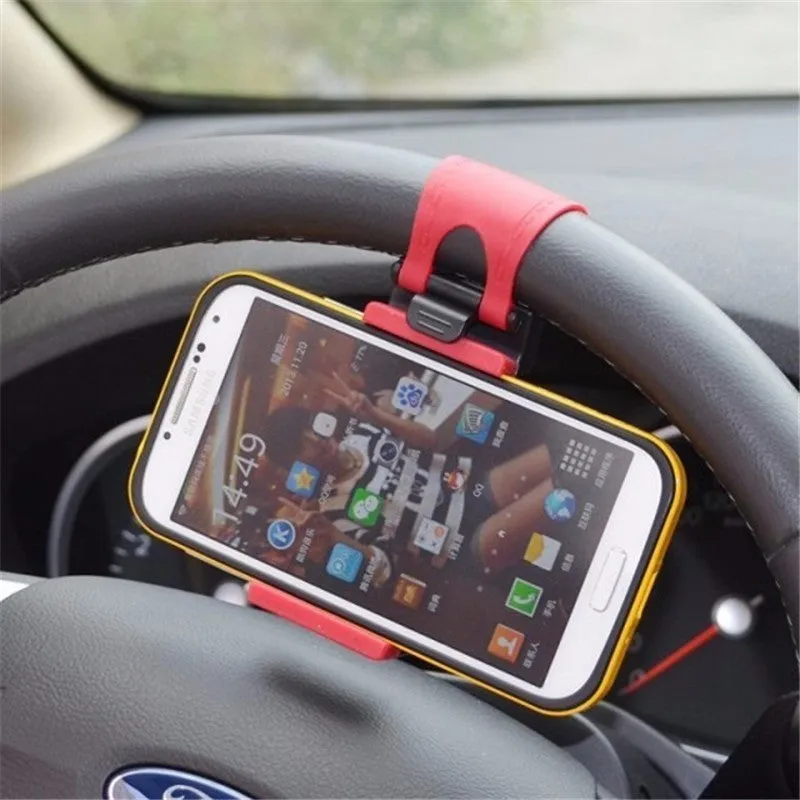 Universal black steering wheel phone holder mount clipped onto a car steering wheel.