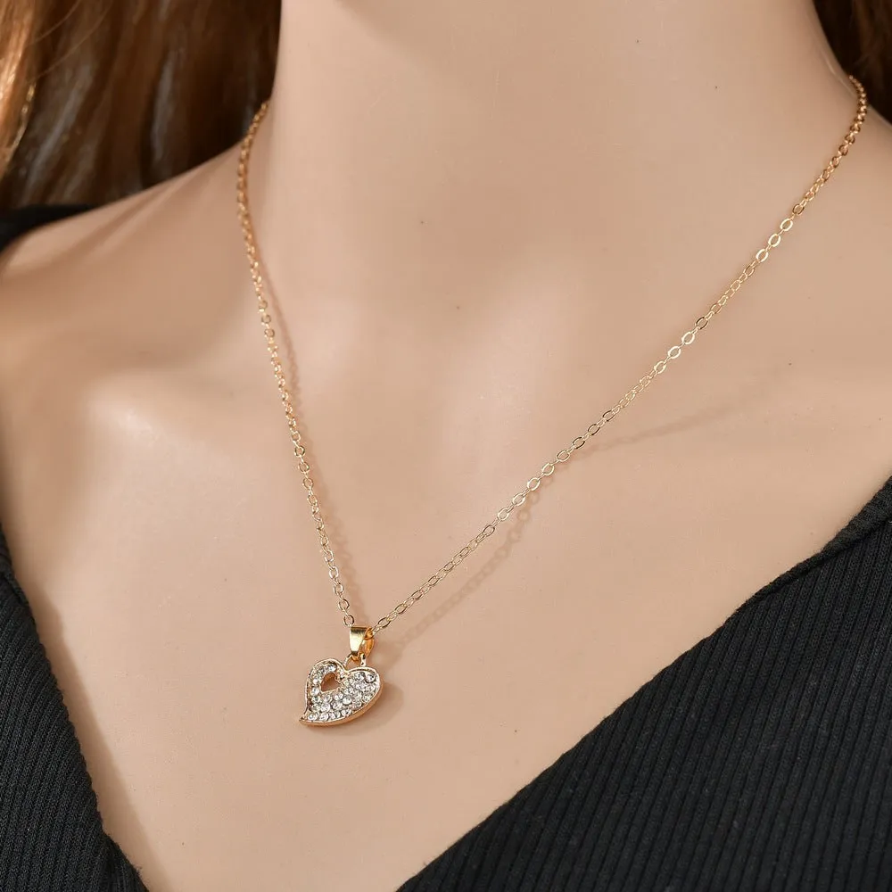 Gold tone alloy jewellery set with earrings, pendant and bracelet featuring love, water drop or bell patterns