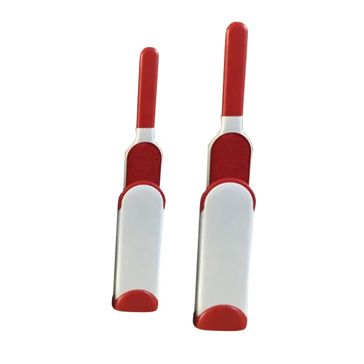 Blue reusable pet hair removal comb with double-sided sticky brush next to its self-cleaning base.