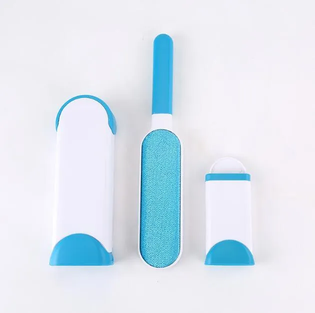Blue reusable pet hair removal comb with double-sided sticky brush next to its self-cleaning base.