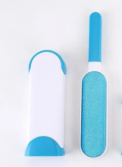Blue reusable pet hair removal comb with double-sided sticky brush next to its self-cleaning base.