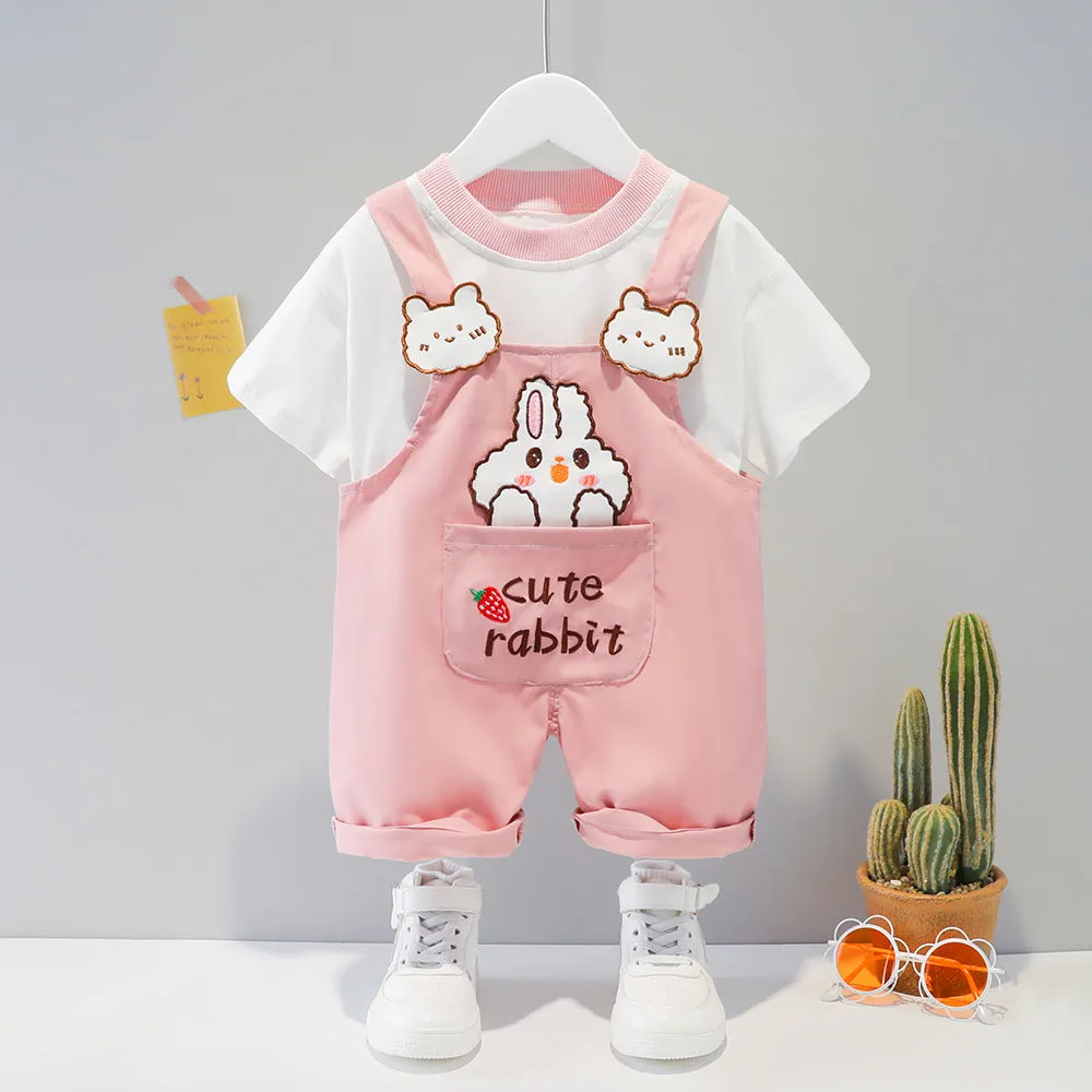 Yellow children's cotton short-sleeved romper with cartoon print and adjustable straps.