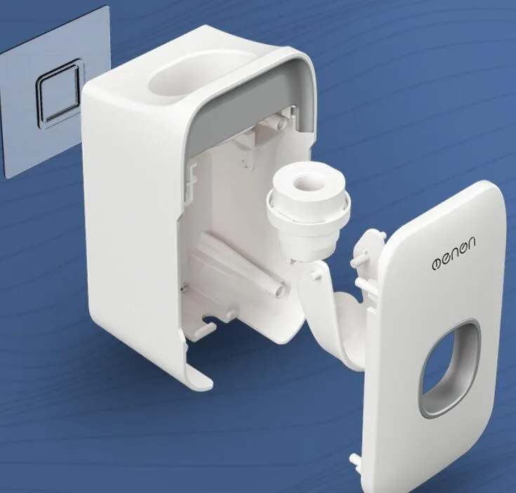 Automatic toothpaste dispenser in grey, blue, and pink colours on a bathroom countertop.