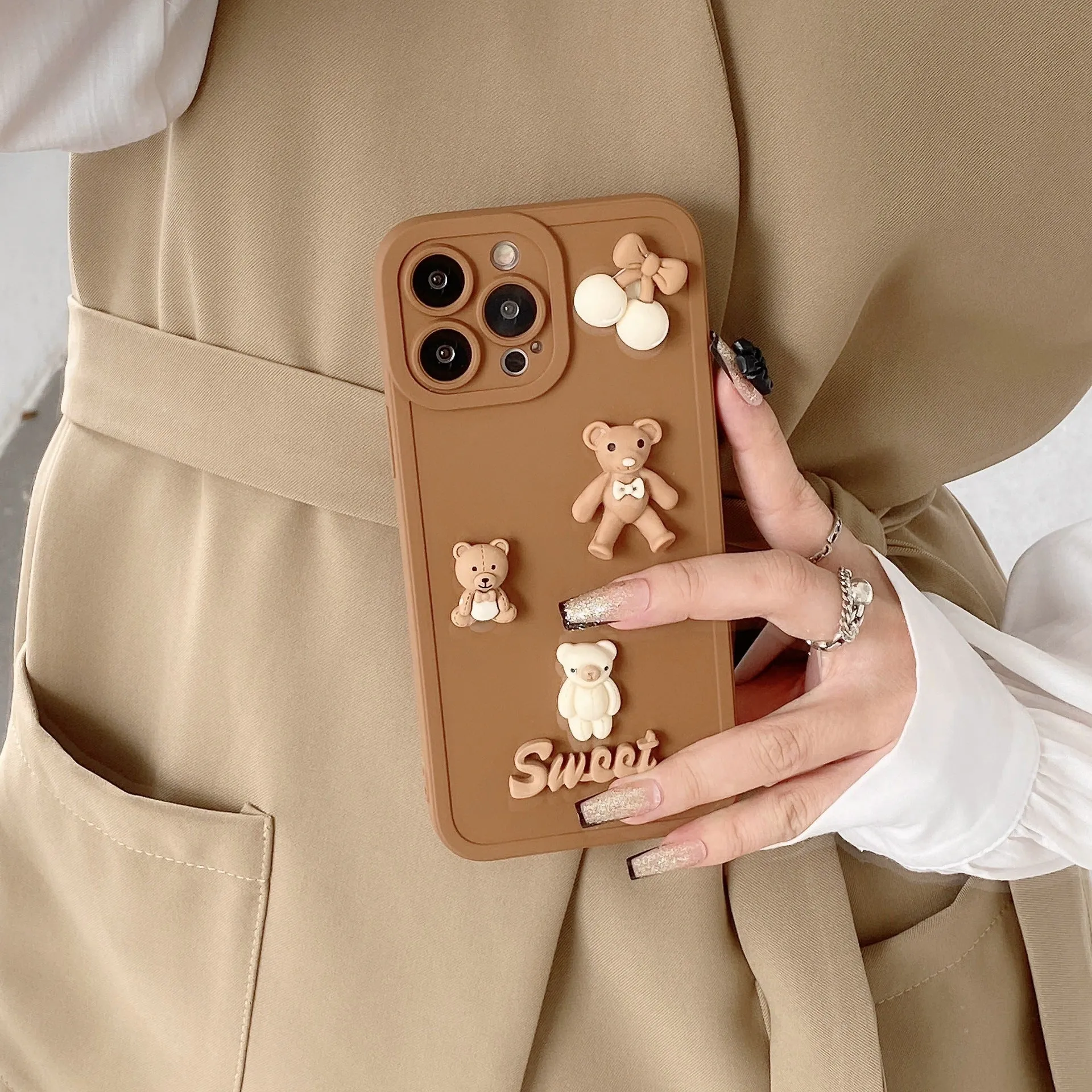 Three-dimensional bear design TPU phone case for iPhone in caramel colour, front view