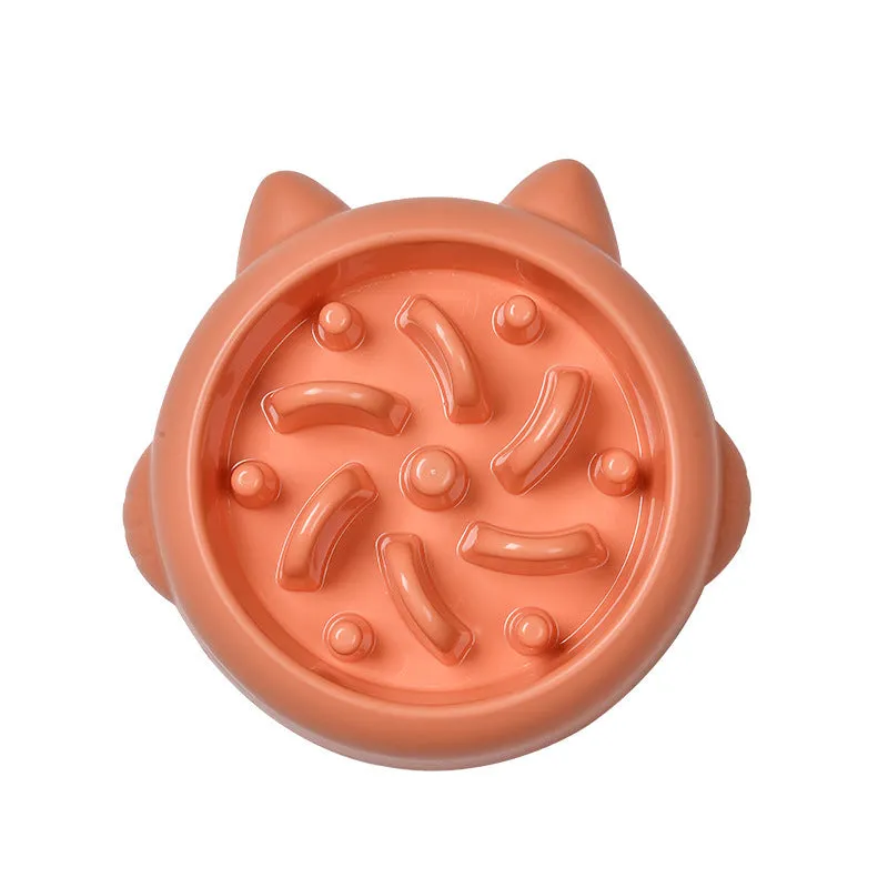 Green bone-shaped slow feeder dog bowl with raised ridges to prevent fast eating.