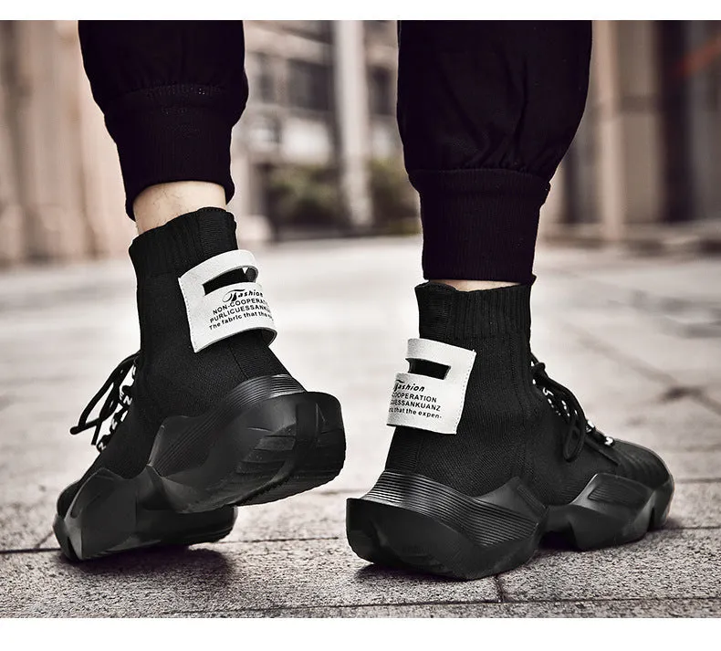 Men's black and white casual sports shoes with mesh lining available in sizes 39 to 47