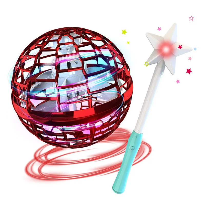 Blue spinning flying ball toy with LED lights floating above child's hand with magic wand