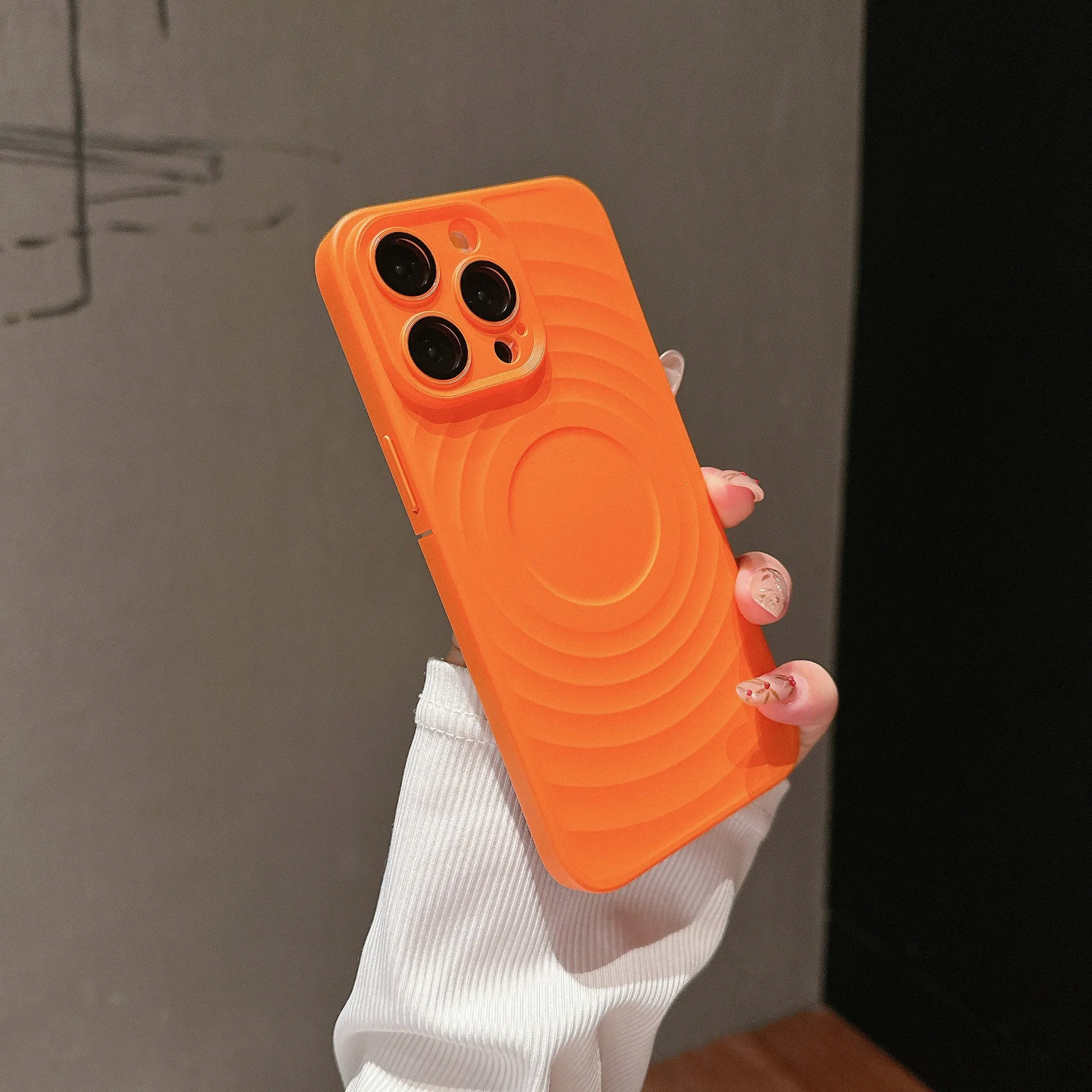 Oil injection magnetic drop-resistant protective cover with frosted PC lens glass for iPhone, showing back of case.