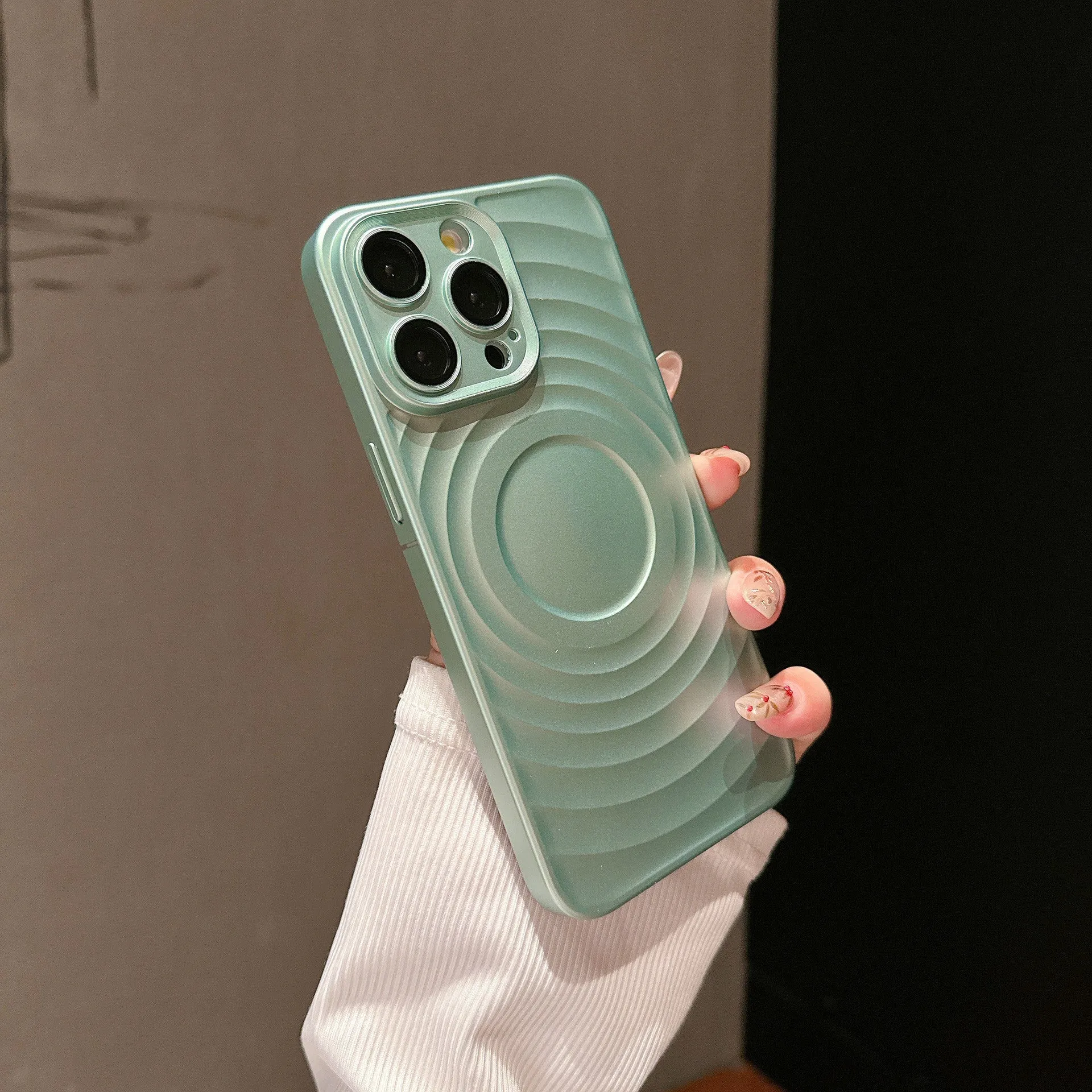 Oil injection magnetic drop-resistant protective cover with frosted PC lens glass for iPhone, showing back of case.