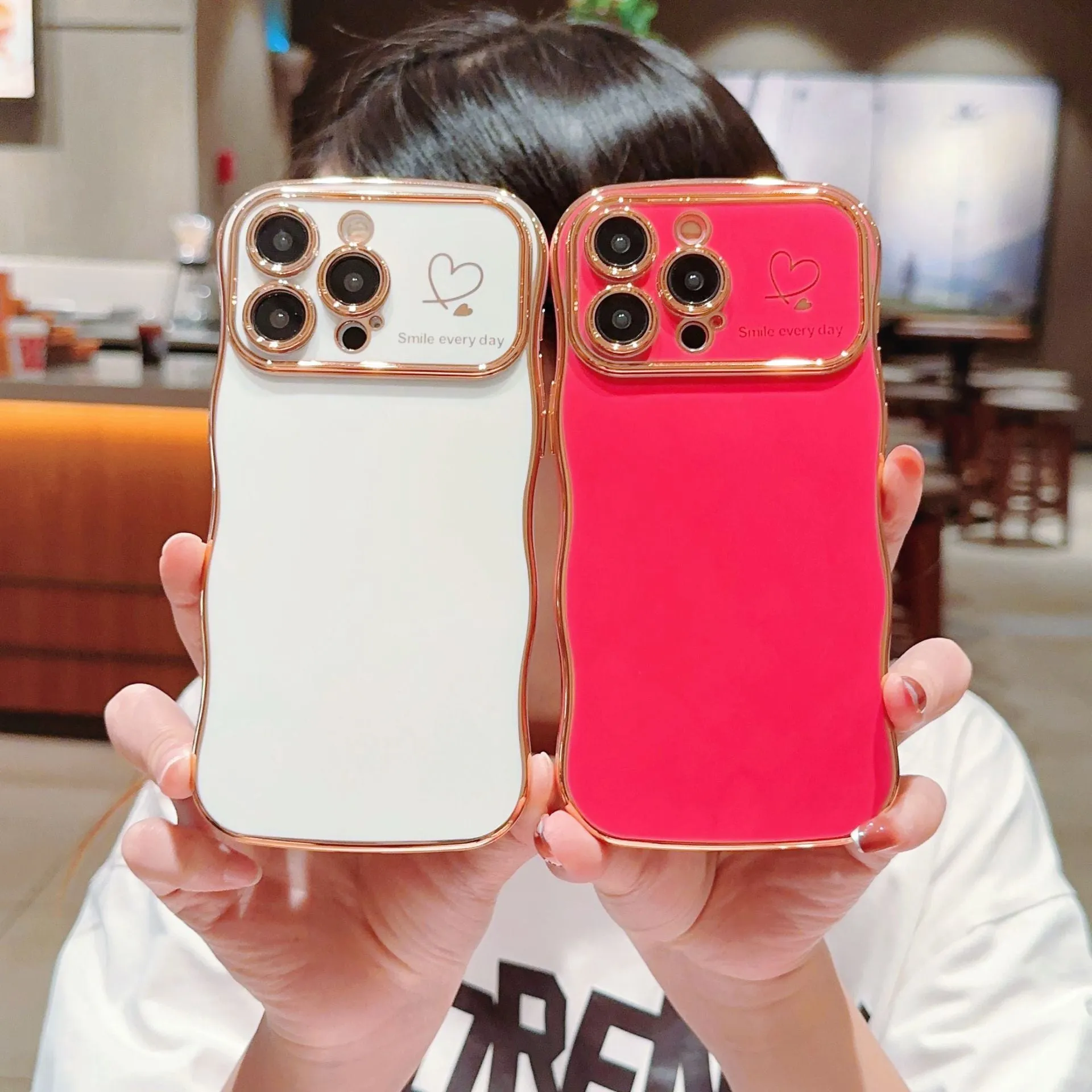 Electroplating wave love large window phone case in black, side view showing back cover and cutouts for iPhone
