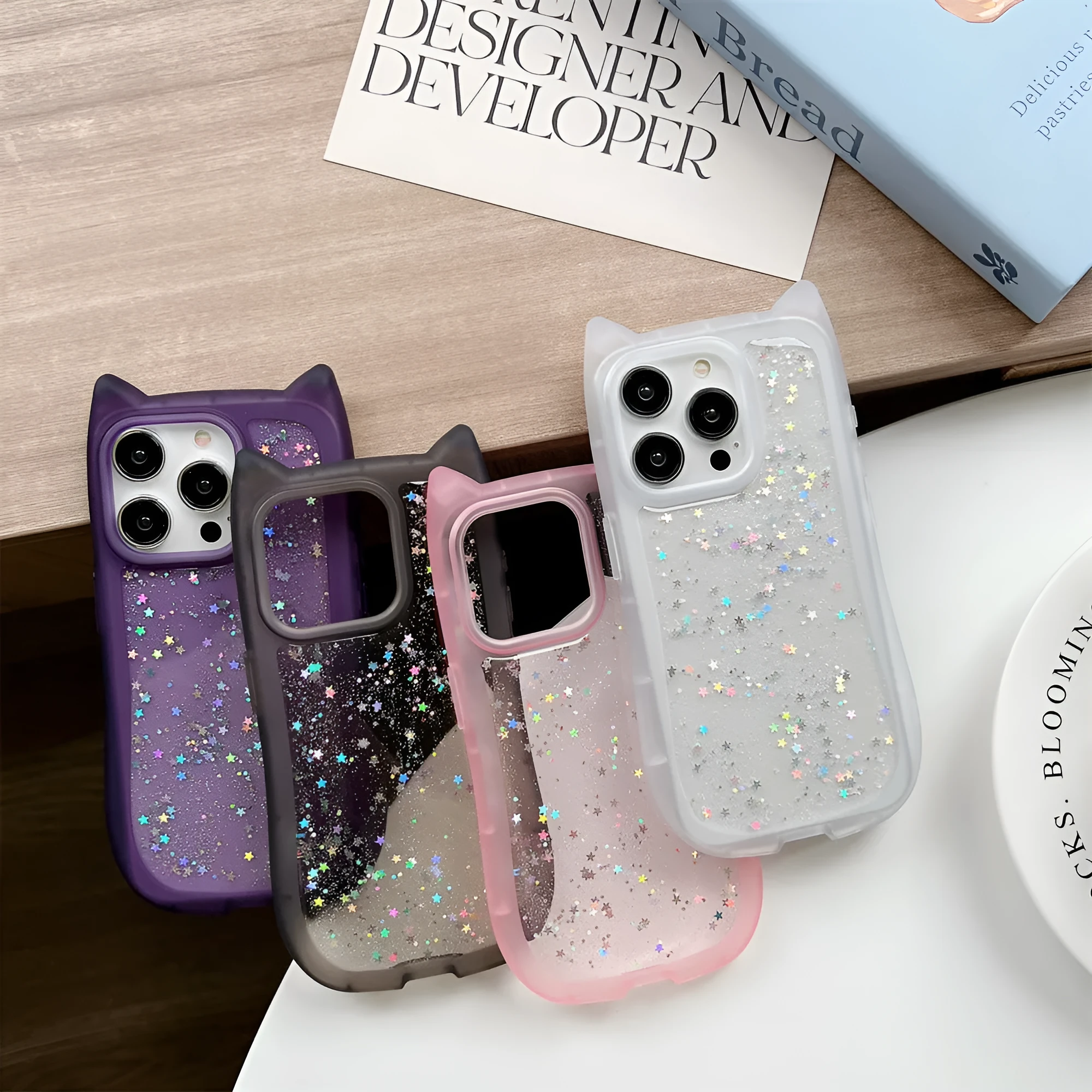 Three-dimensional cat ears epoxy glitter TPU phone case for Apple iPhone in pink with glitter accents