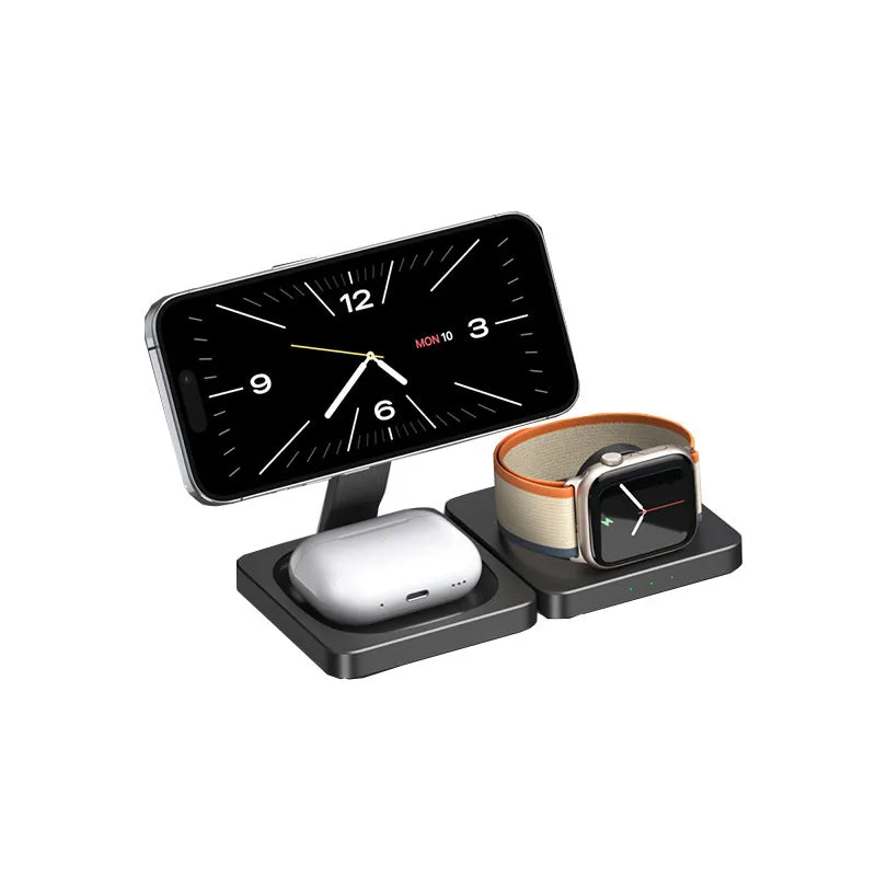 Three in one folding magnetic wireless charger in black, folded flat on a desk showing charging pads for phone and watch