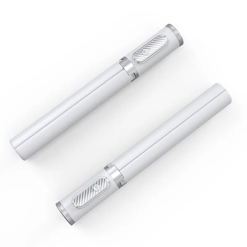 Black gold aluminum alloy Bluetooth selfie stick tripod extended to 1.7m holding a smartphone