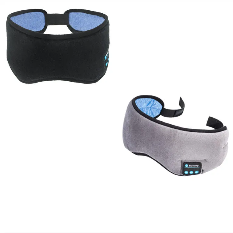 A black wireless Bluetooth sleep mask with built-in small earphones, shown on a model, designed for comfortable, pressure-free music listening during rest.