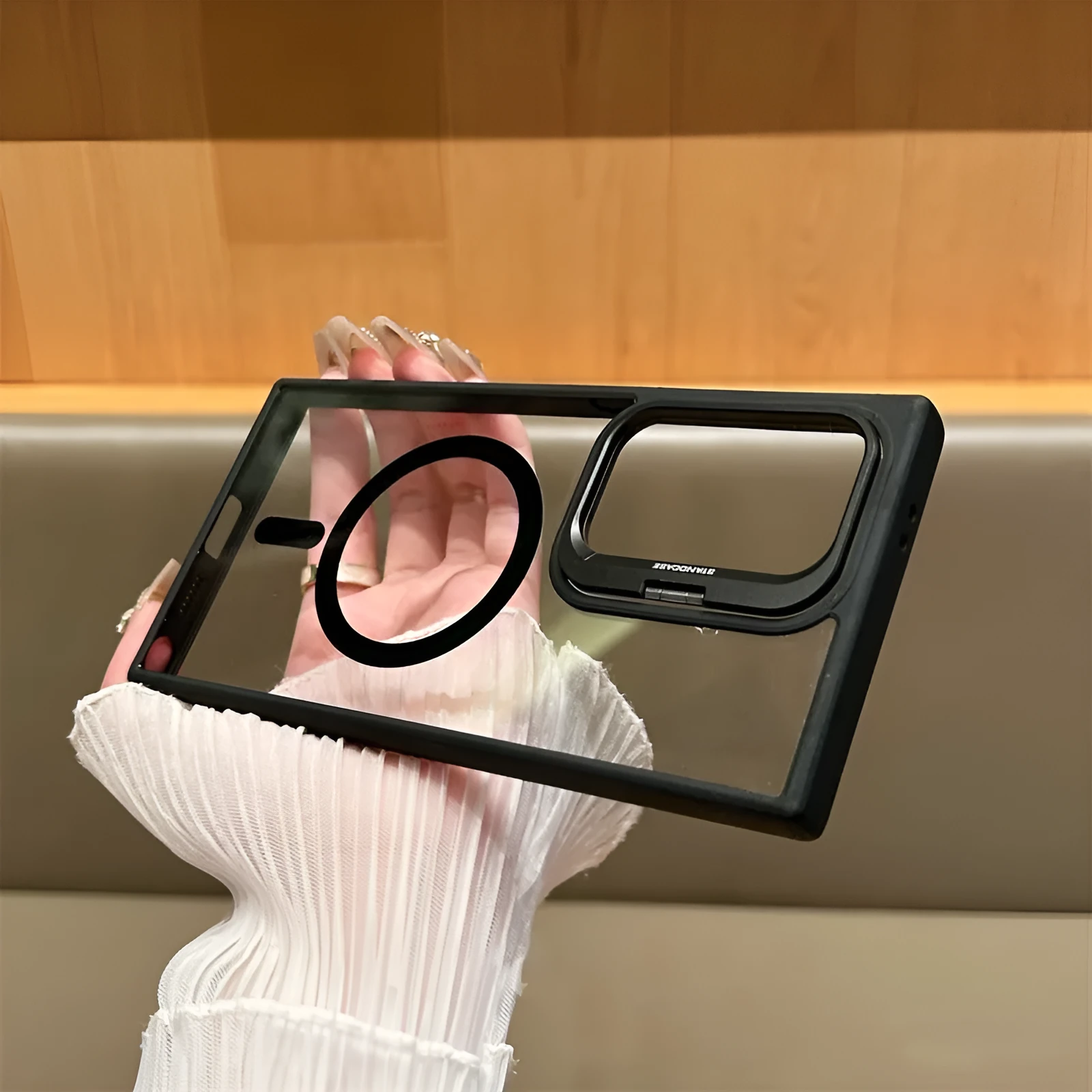 Transparent magnetic phone case with invisible bracket for Samsung Galaxy, black colour, flat lay view