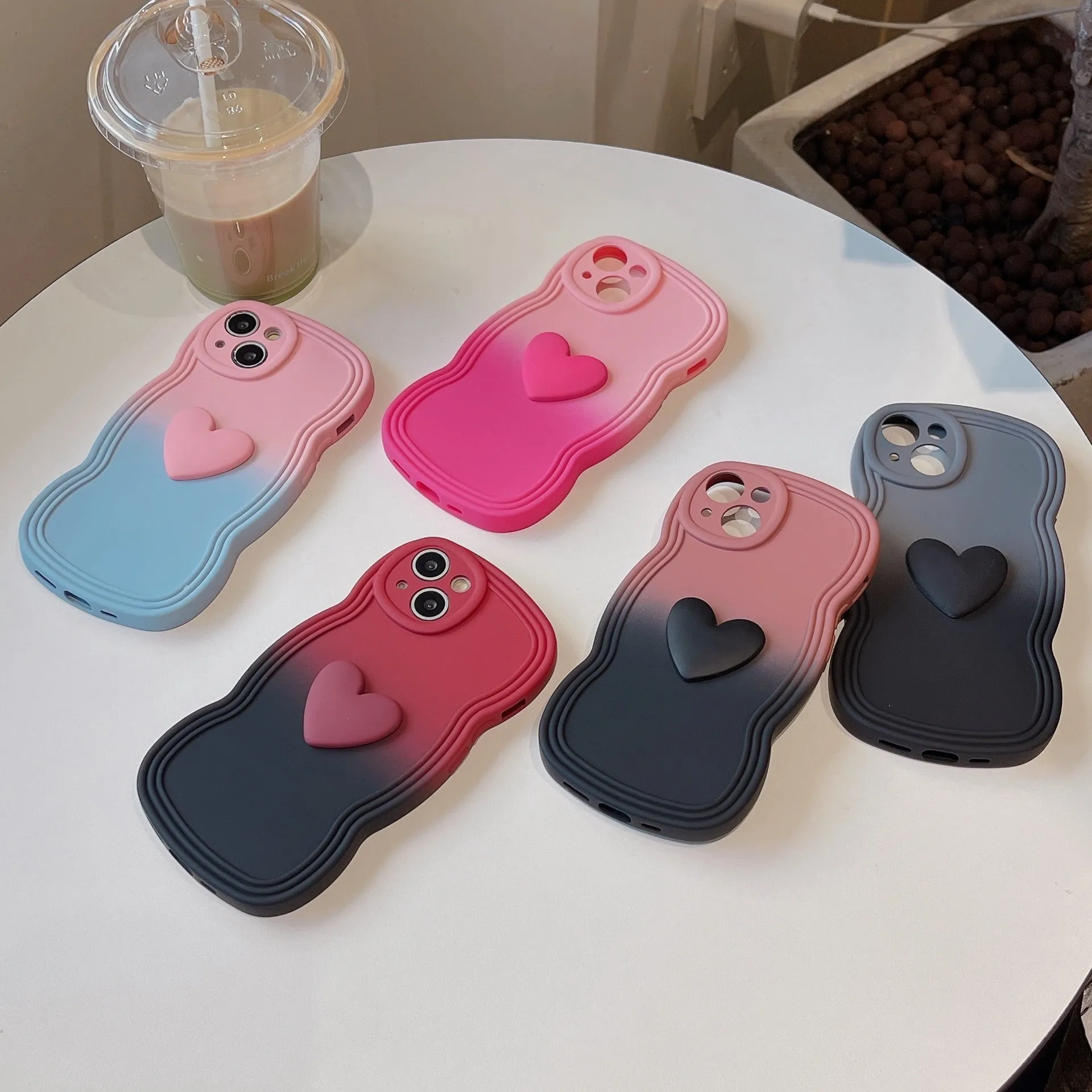 Liquid silicone love heart wavy edge phone case in red gradient black for iPhone 14 Pro Max
