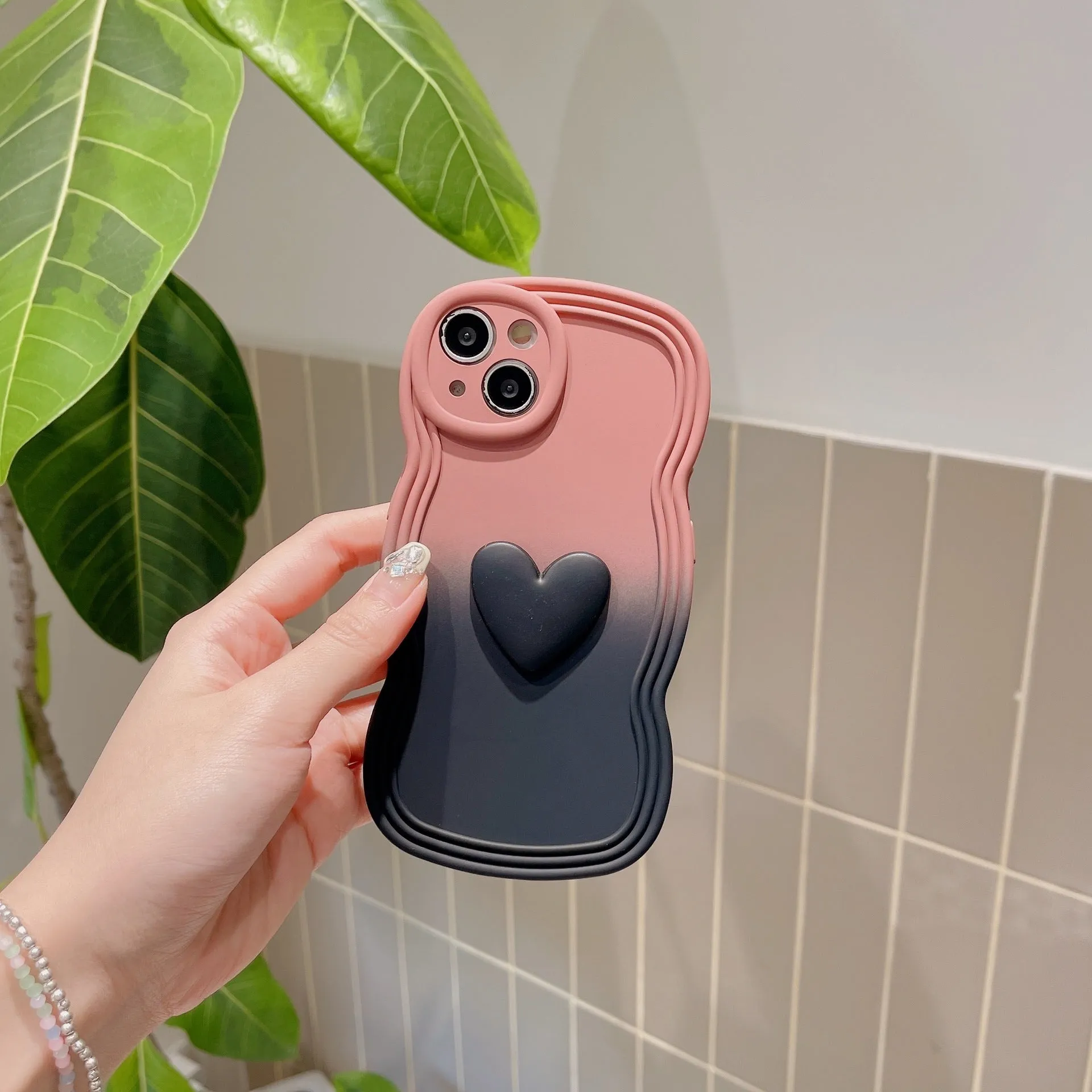 Liquid silicone love heart wavy edge phone case in red gradient black for iPhone 14 Pro Max