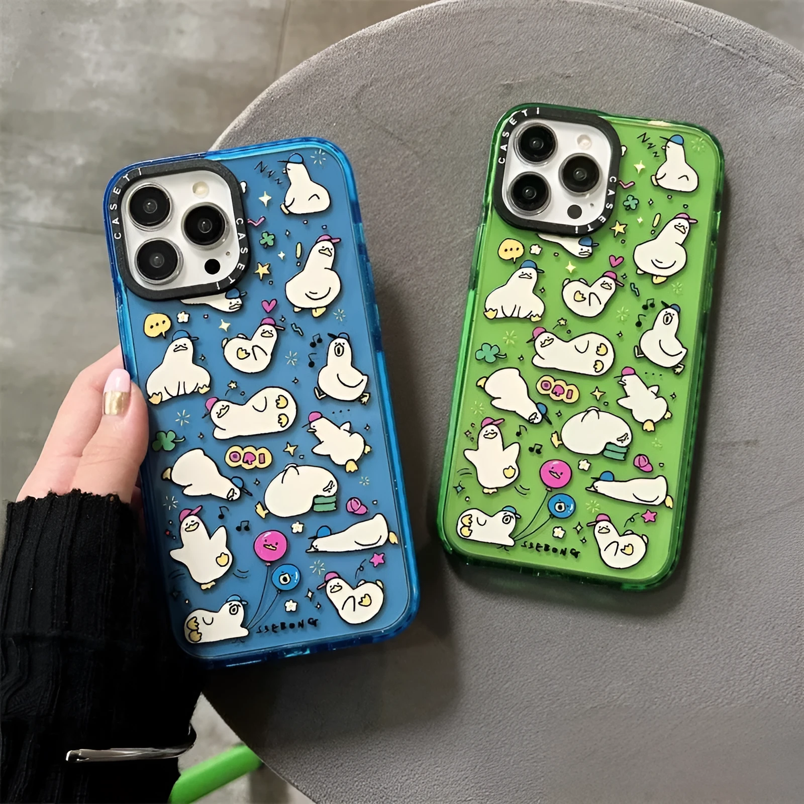 Little Duck Creative drop-resistant PC phone case with cartoon duck pattern and flash acrylic finish in green for iPhone